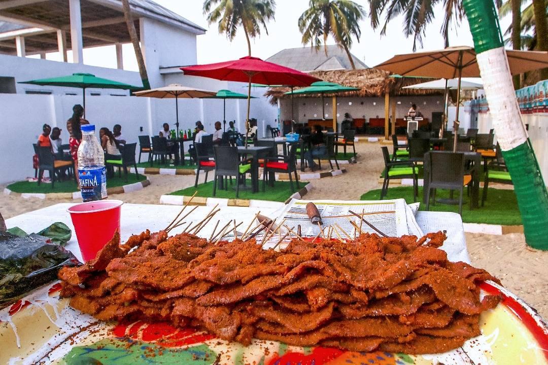 Suya dining outdoors